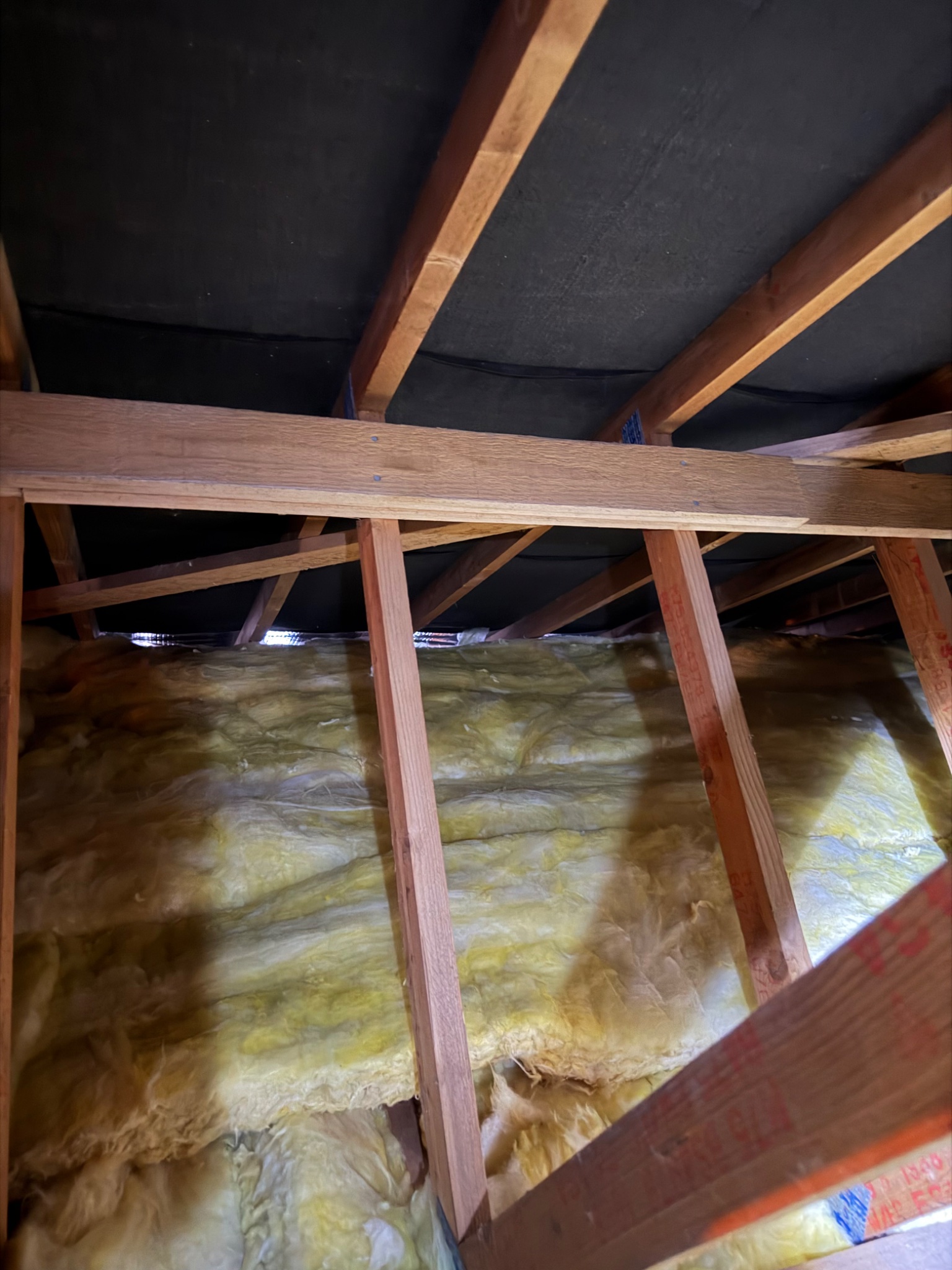 Completed loft insulation across the roof space of a home in Carlisle